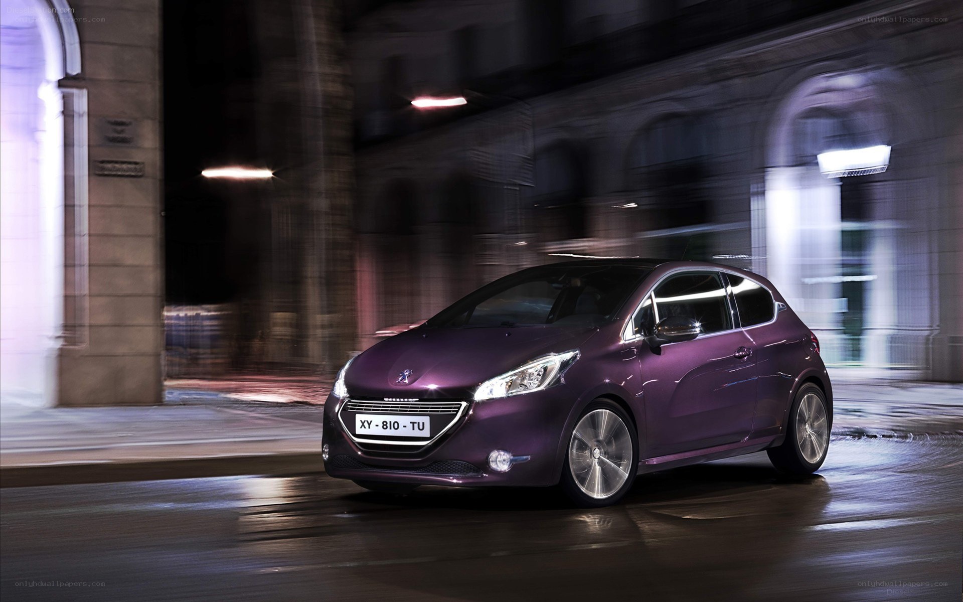 Purple Peugeot driving at night