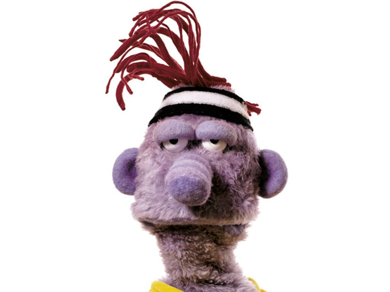 purple puppet with red hair