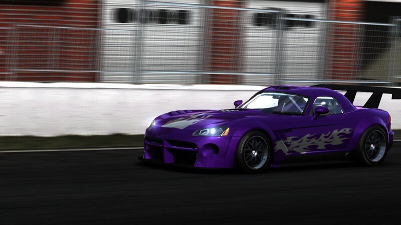 purple race car on track