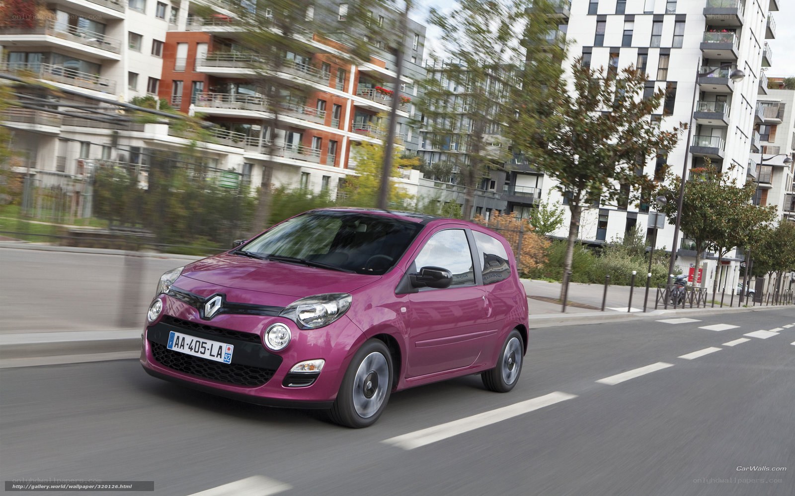 purple renault car in city