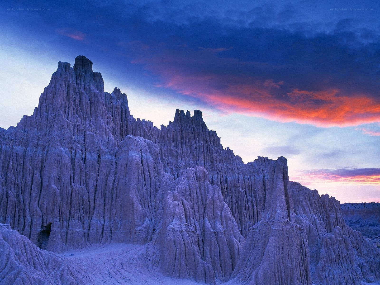 Purple rock formations at sunset