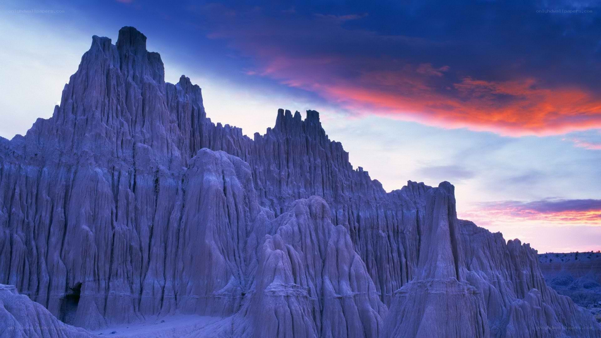 Purple rock formations at sunset