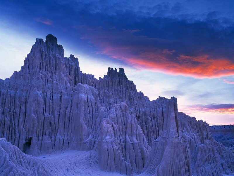 Purple rock formations at sunset
