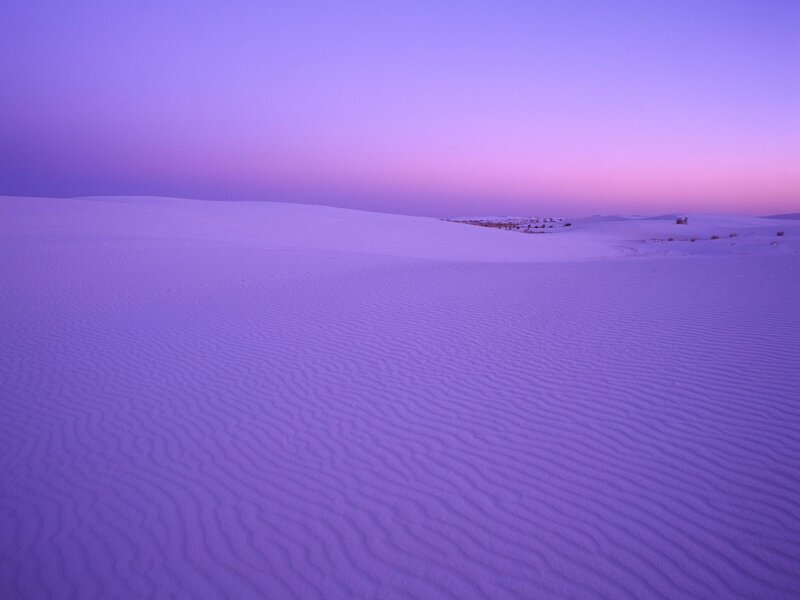 Purple sand dunes at dusk