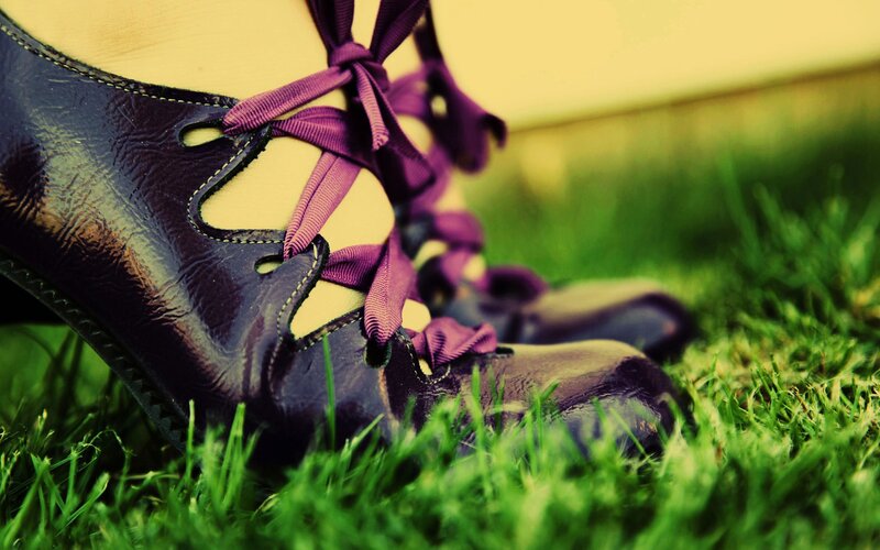 purple shoes on grass