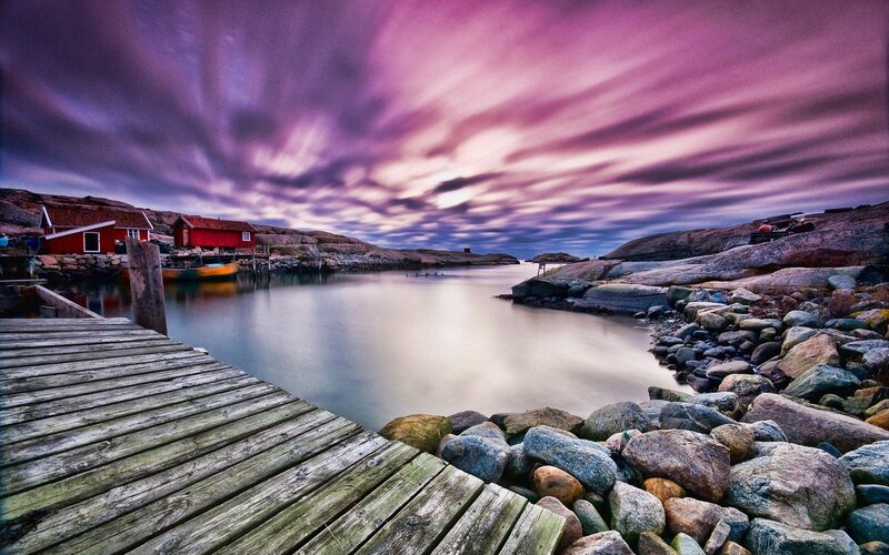 Purple sky over a coastal village