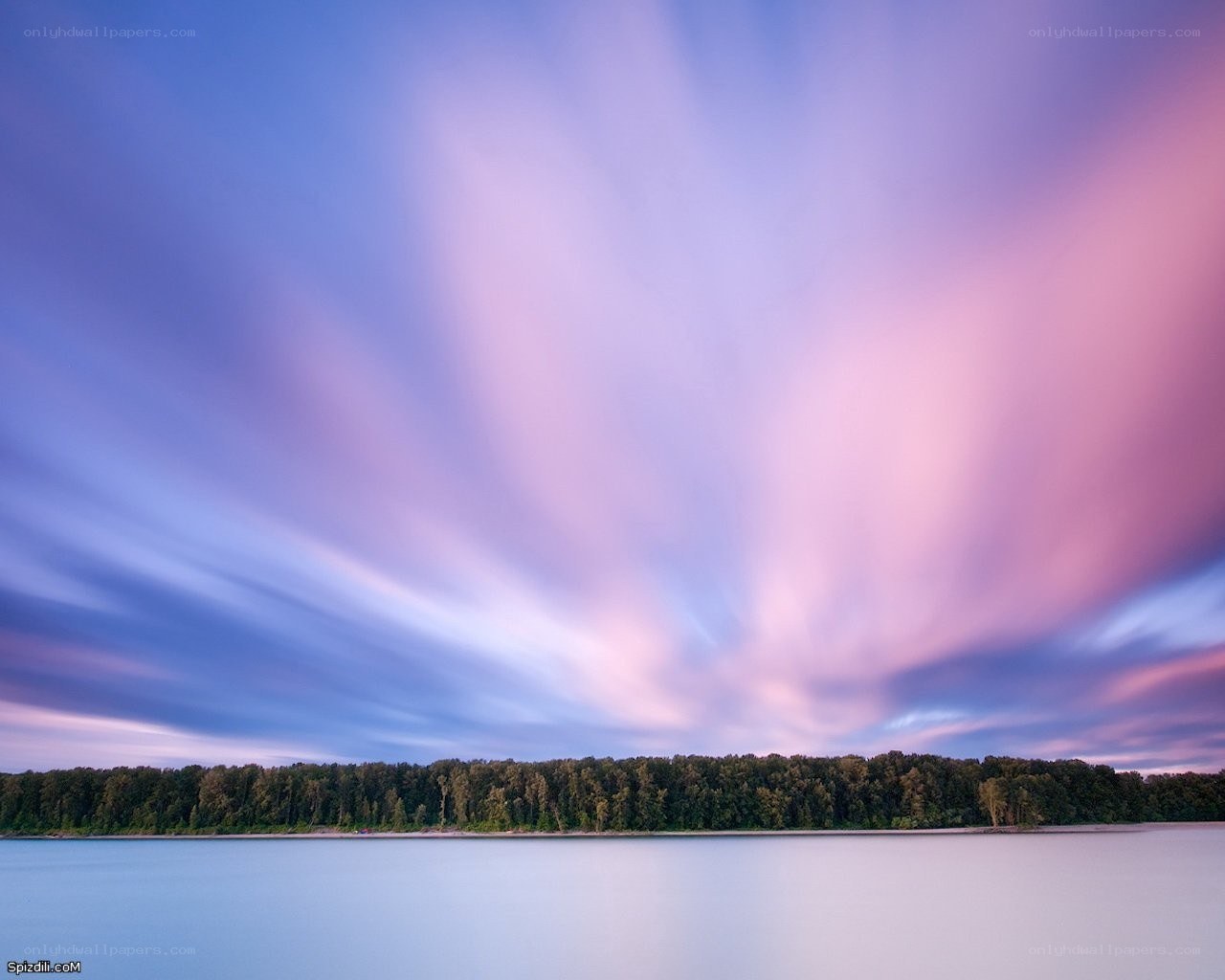 Purple sky over calm lake