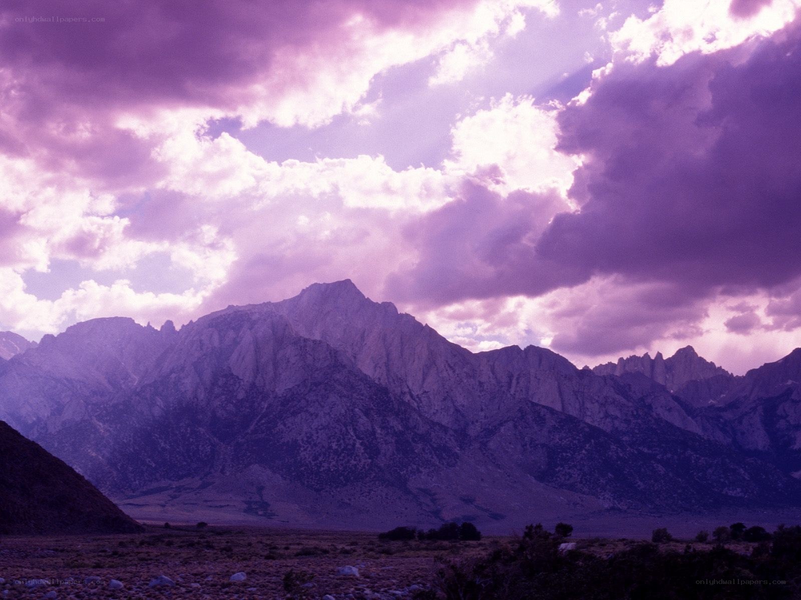 Purple sky over mountain range
