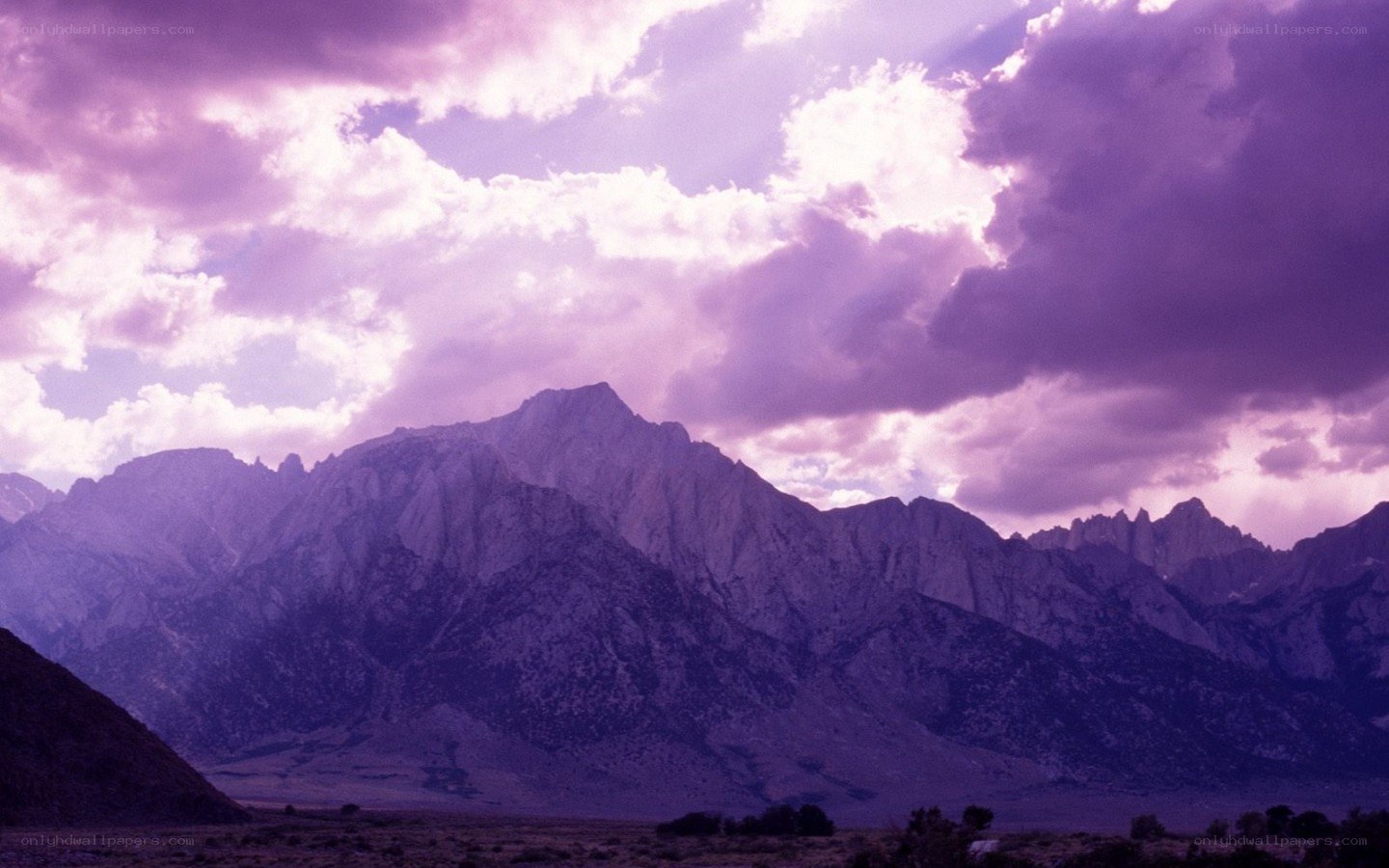 Purple sky over mountain range
