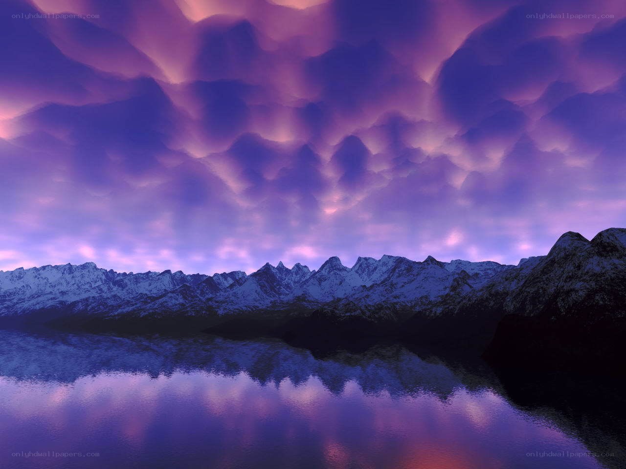 Purple sky over snowy mountains