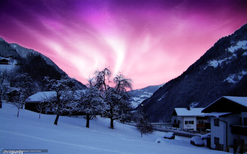 Purple sky over snowy village