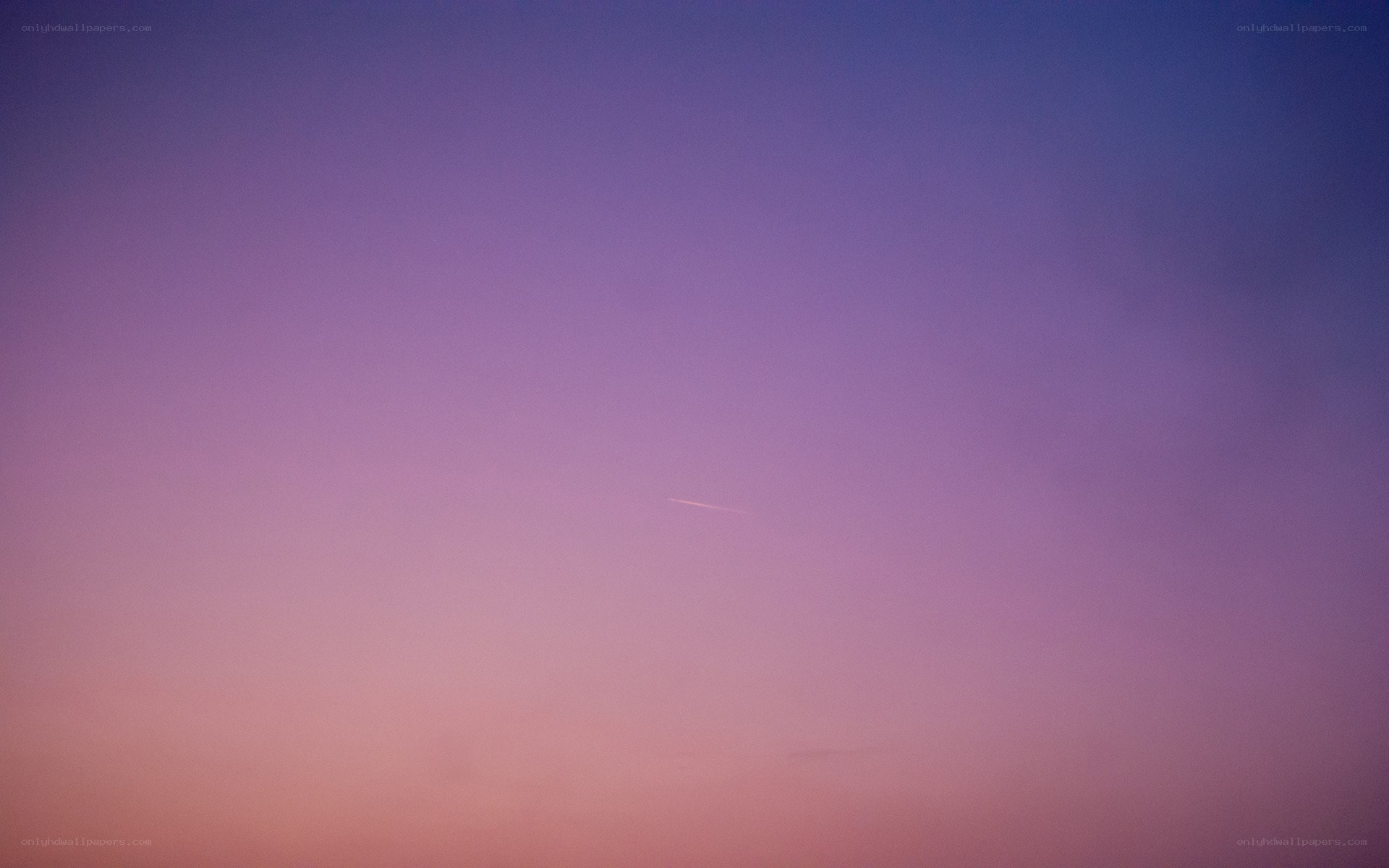 purple sky with airplane trail