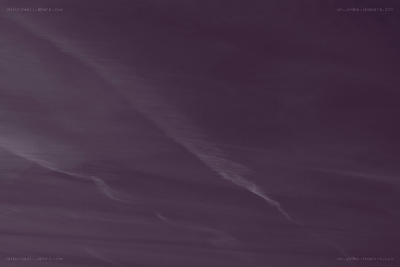 purple sky with wispy clouds