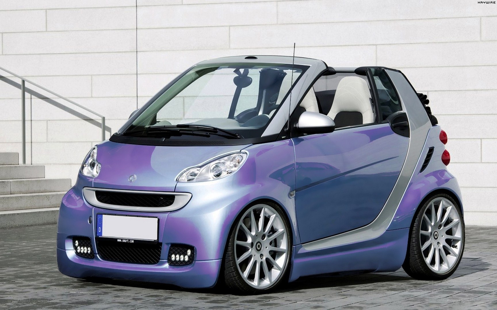 Purple Smart car with custom wheels