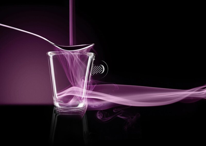 Purple smoke in a glass cup