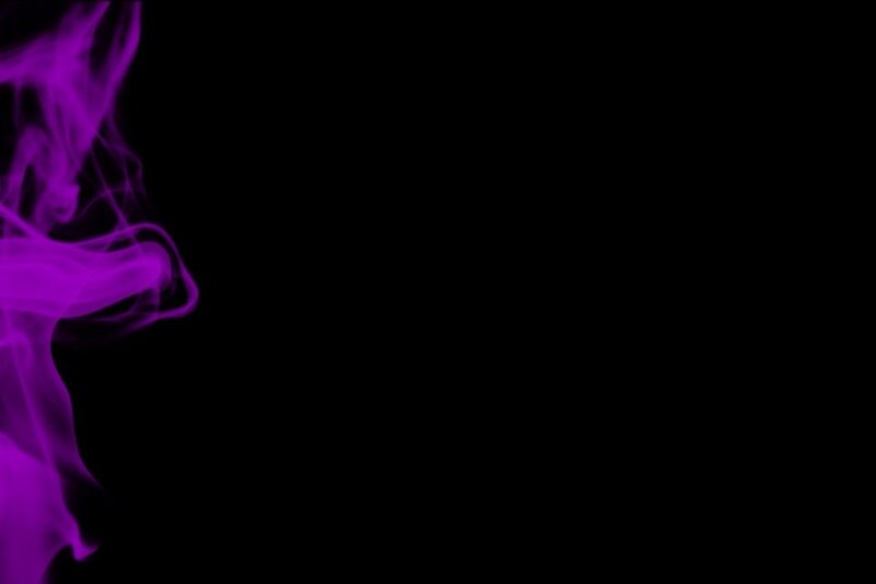 purple smoke on black