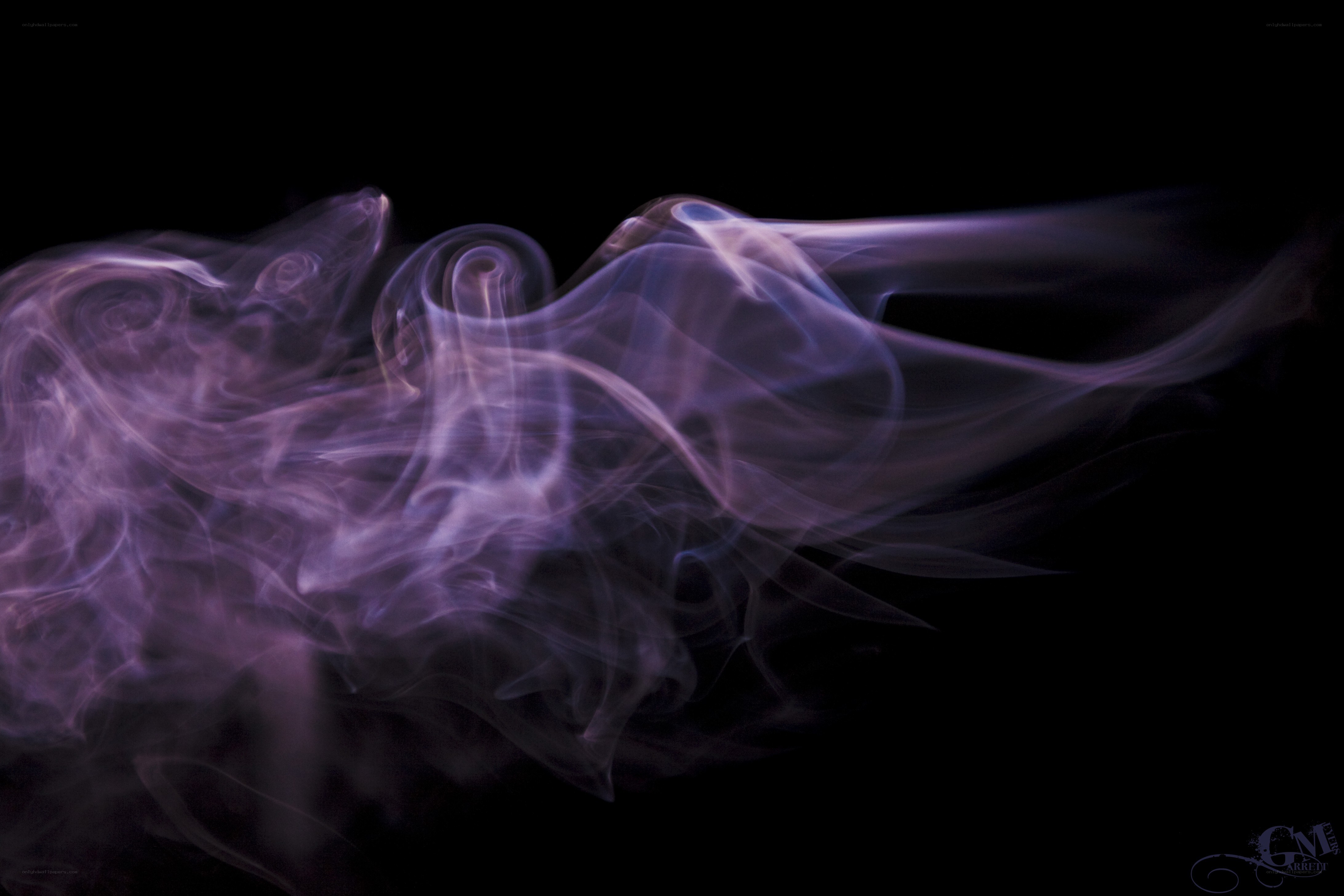 purple smoke swirls