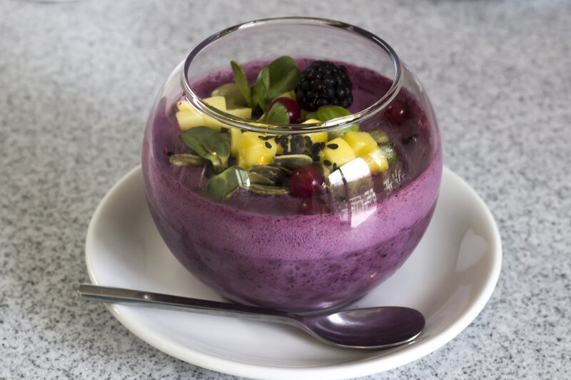 purple smoothie bowl with fruit
