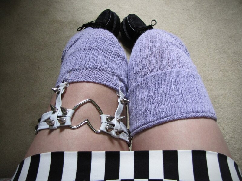 purple socks and spiked garter