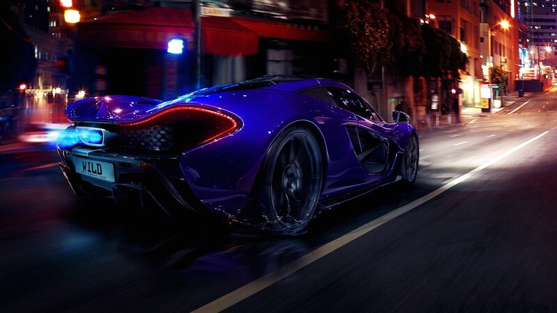 Purple sports car at night