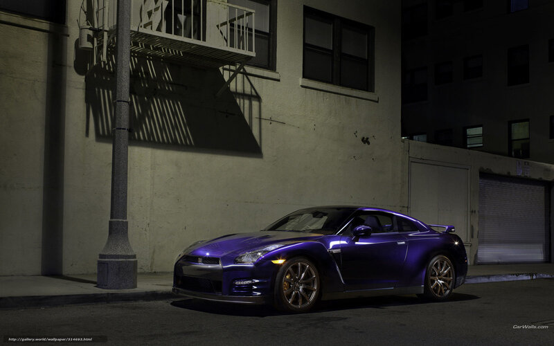 Purple sports car at night