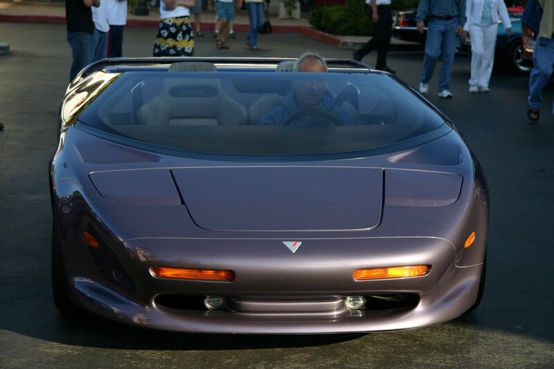 purple sports car at show