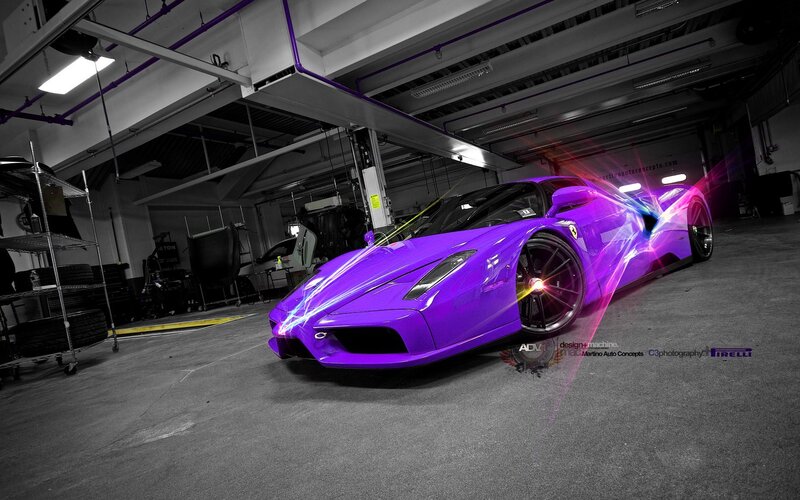 purple sports car in garage