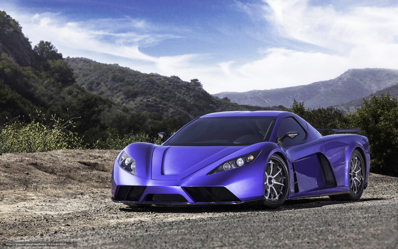 Purple sports car on a dirt road