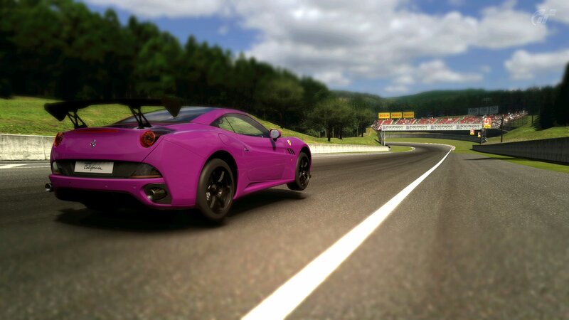 purple sports car on racetrack