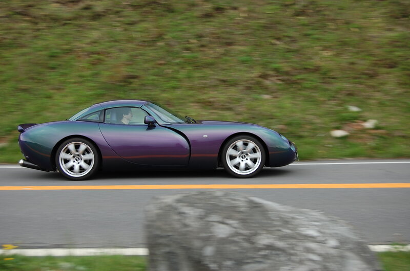 purple sports car on road
