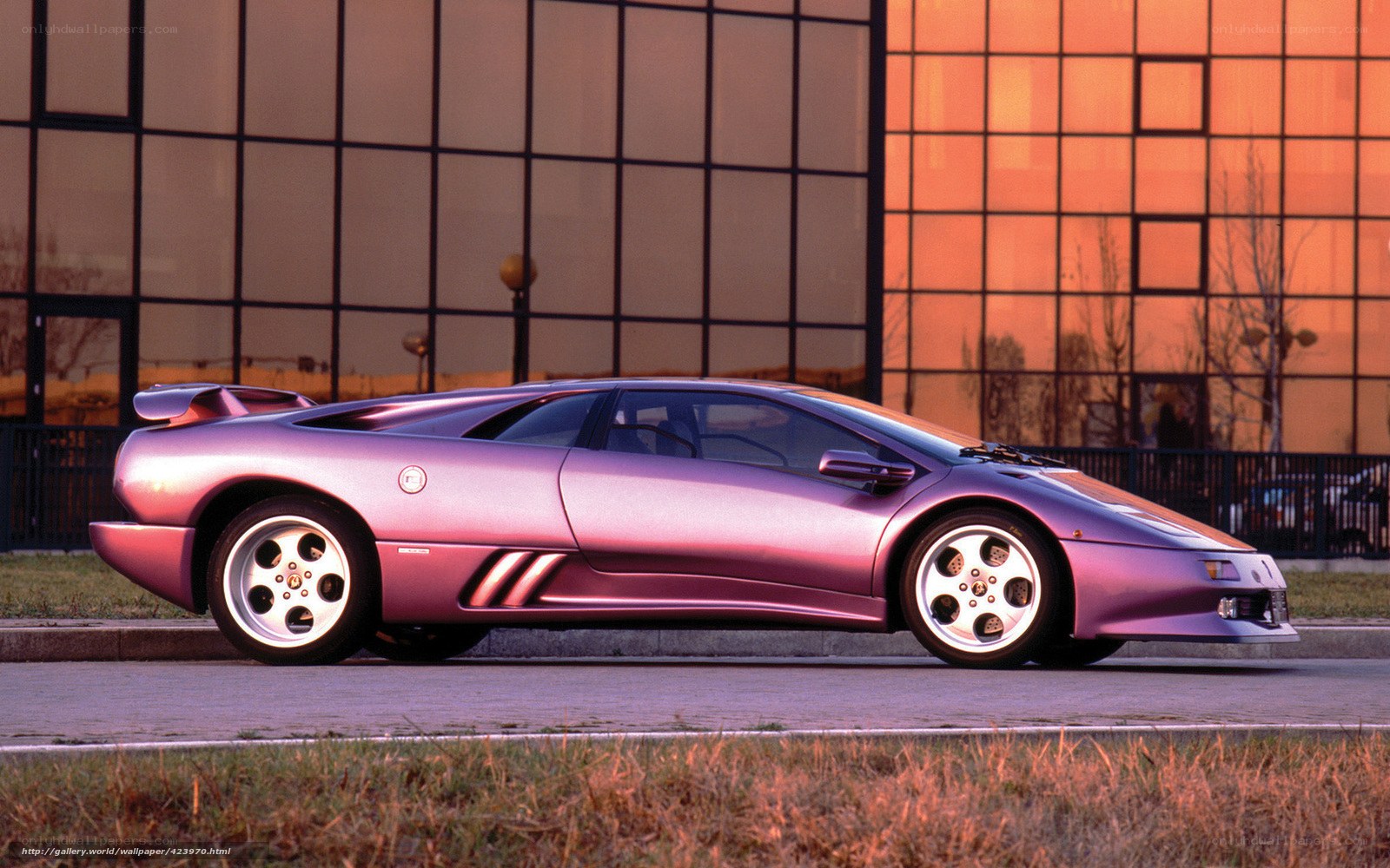 purple sports car on street