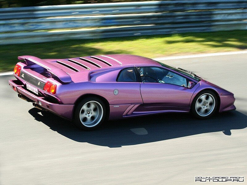 purple sports car on track