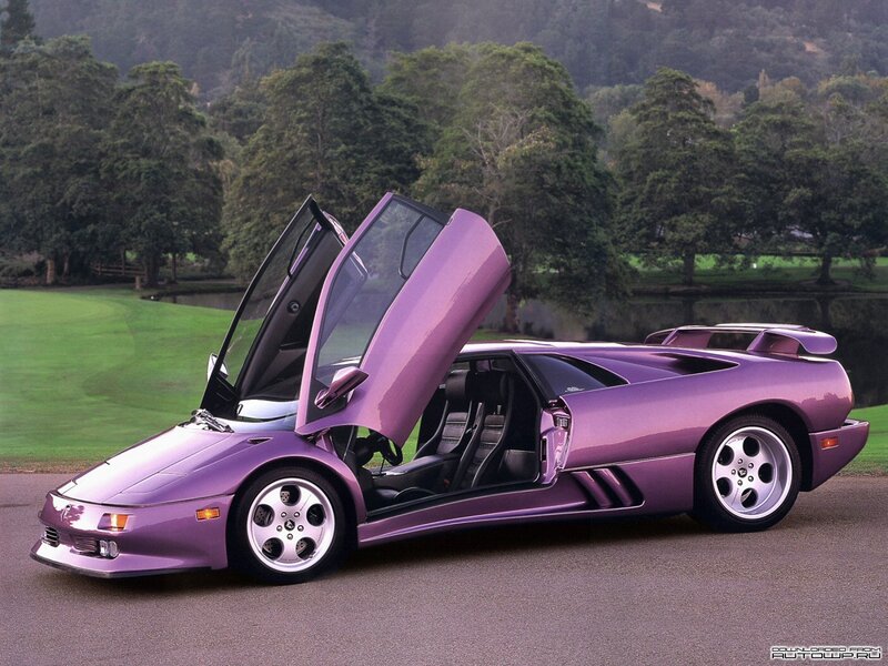 purple sports car with open doors