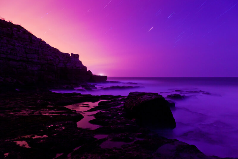 Purple Star Trails over Ocean