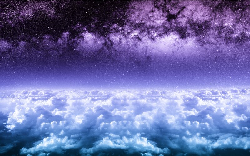 purple starry sky above clouds