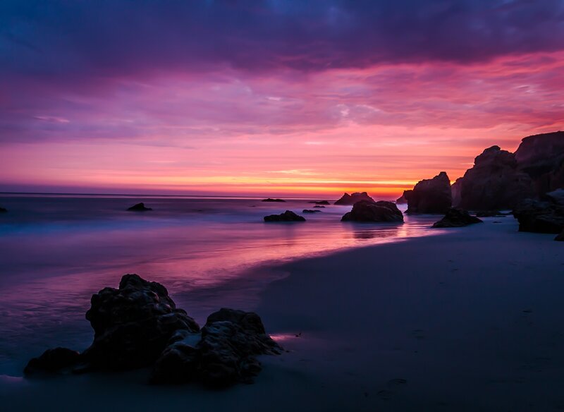 Purple Sunset at Beach — Dramatic, Photograph, Rocks