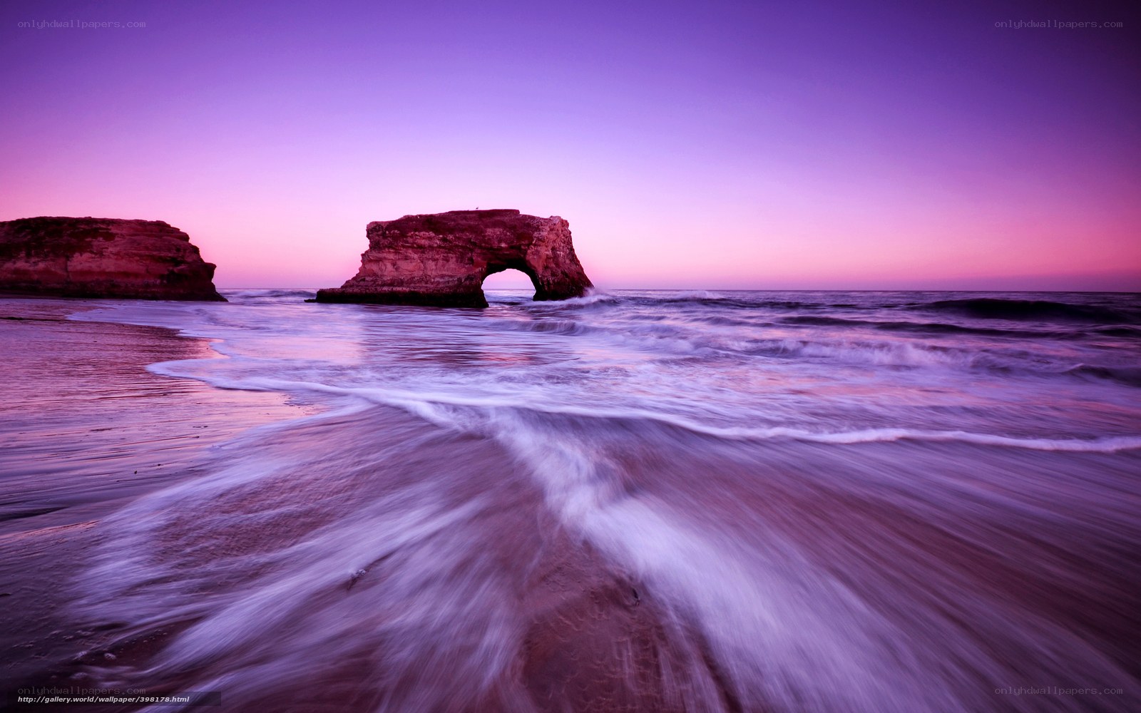 Purple sunset at natural arch
