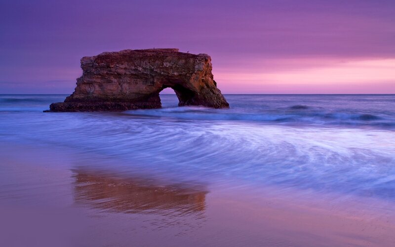 Purple sunset at sea arch