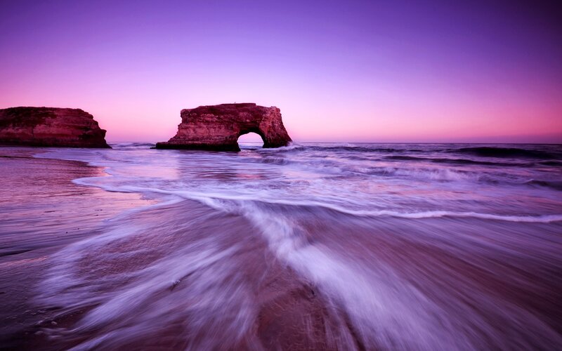 Purple sunset at sea arch
