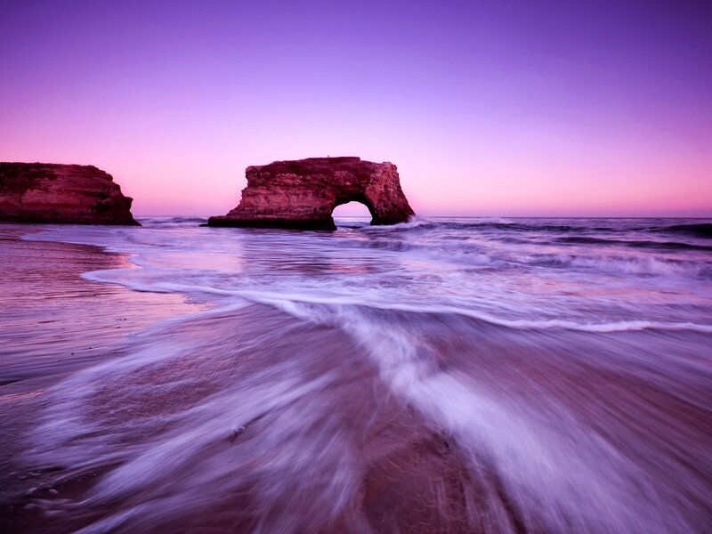 Purple sunset at sea arch