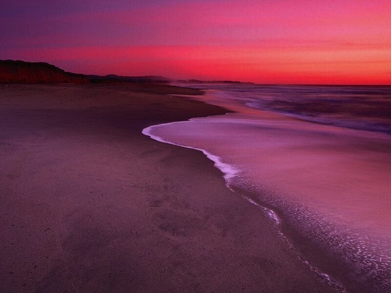 Purple sunset on a beach