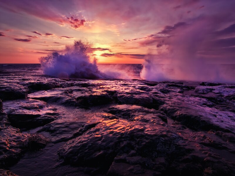 Purple Sunset on Rocky Shore