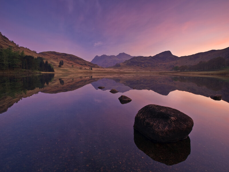 Purple sunset over a calm lake