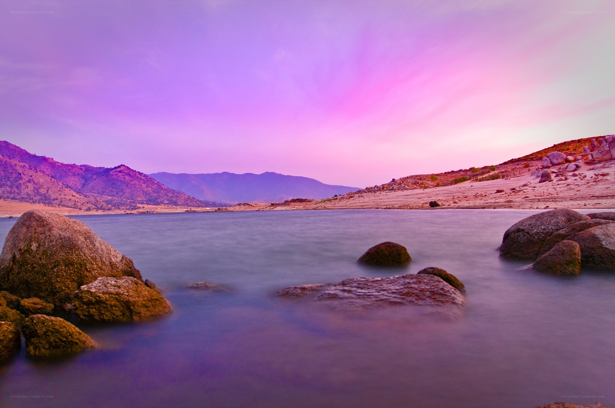 Purple sunset over a calm lake