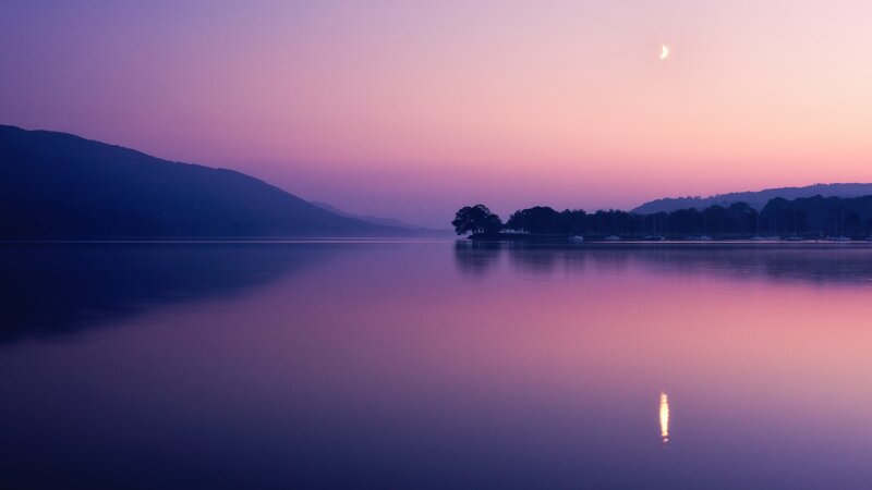 Purple sunset over a calm lake