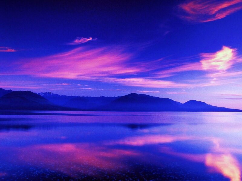 Purple sunset over a calm lake