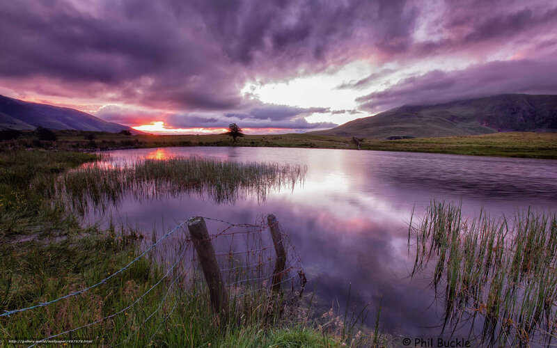 Purple sunset over a calm lake