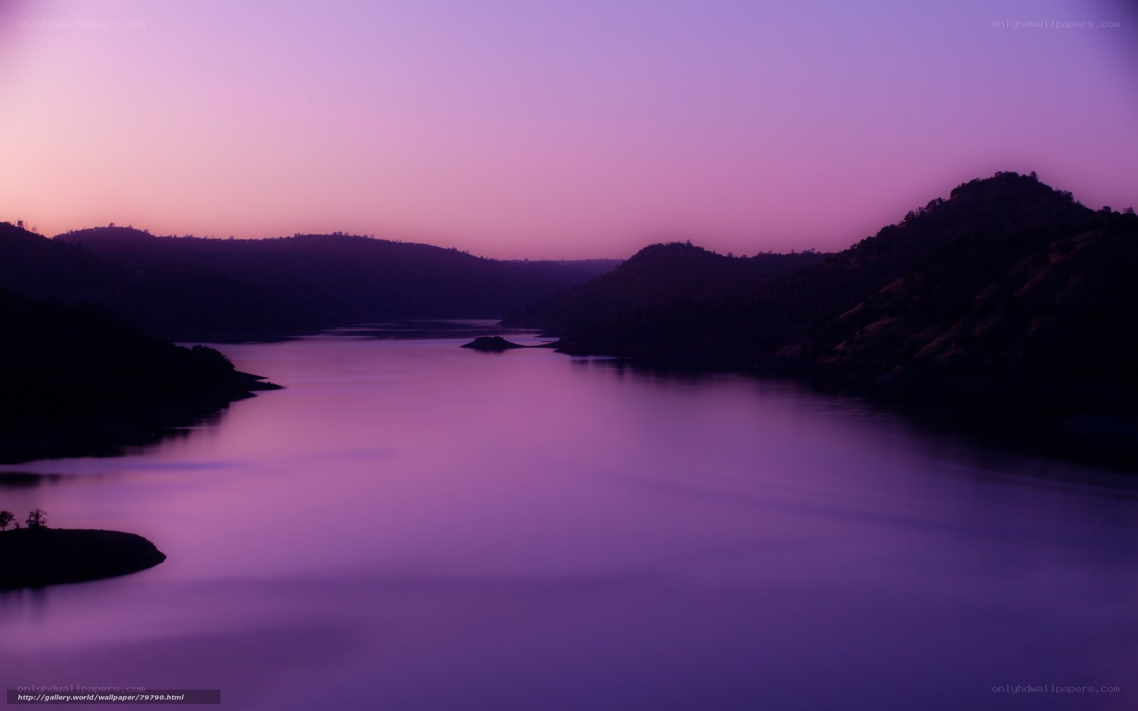 Purple sunset over a calm lake