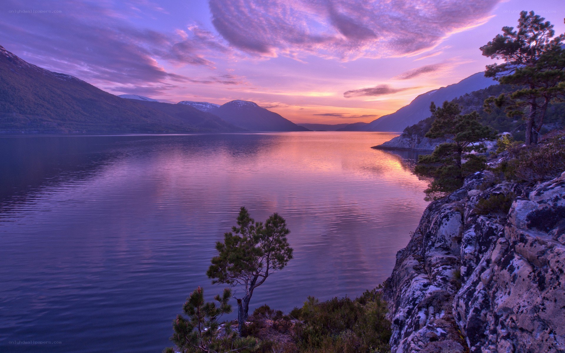 Purple sunset over a fjord