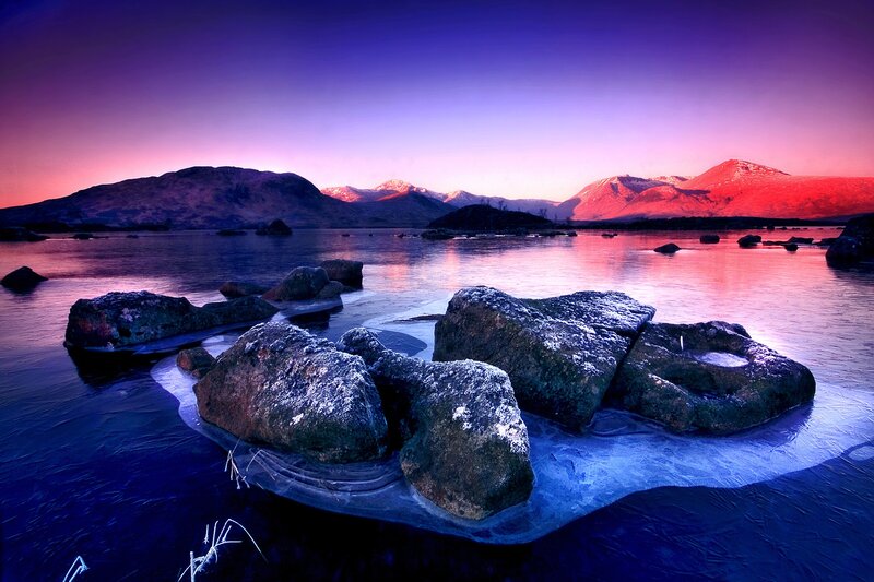 Purple sunset over a frozen lake